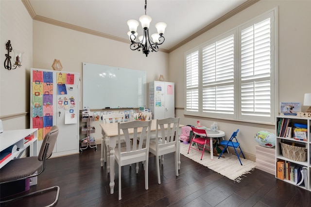 game room featuring a notable chandelier, crown molding, and dark wood-type flooring