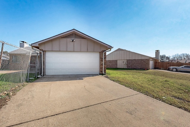 garage with a yard