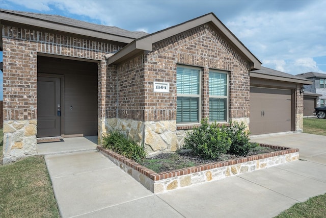 entrance to property with a garage