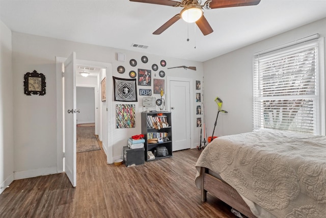 bedroom featuring hardwood / wood-style floors and ceiling fan