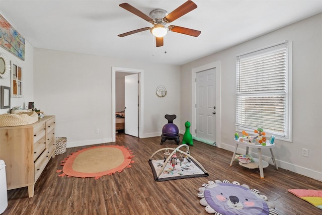 interior space featuring dark hardwood / wood-style floors and ceiling fan