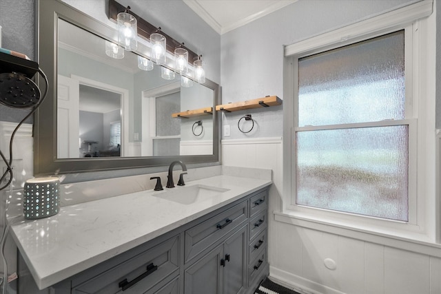 bathroom with vanity and crown molding