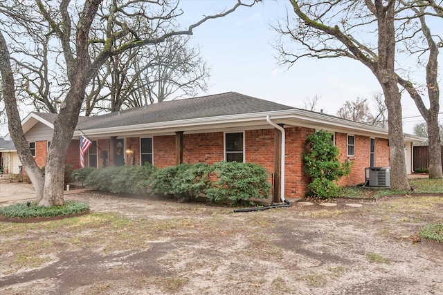 view of front of home featuring cooling unit