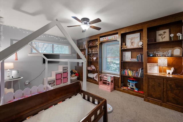 carpeted bedroom featuring multiple windows