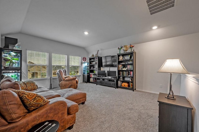 living room with lofted ceiling and carpet flooring