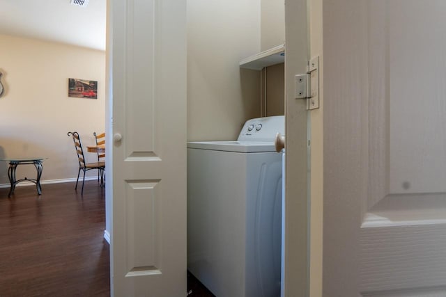 laundry room with washer / clothes dryer and dark hardwood / wood-style flooring