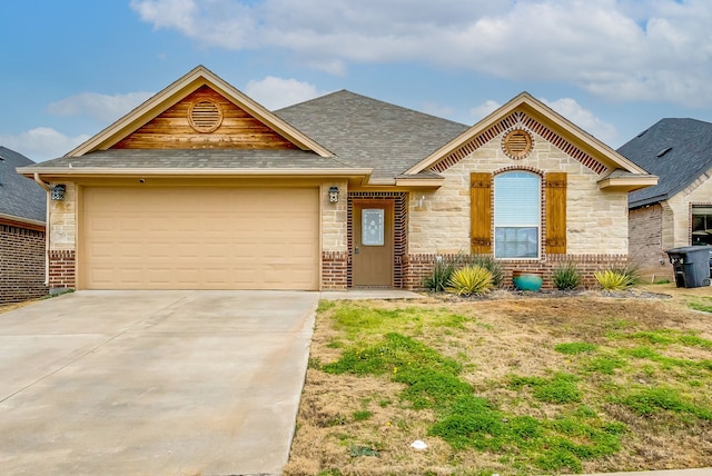 view of front of home with a garage