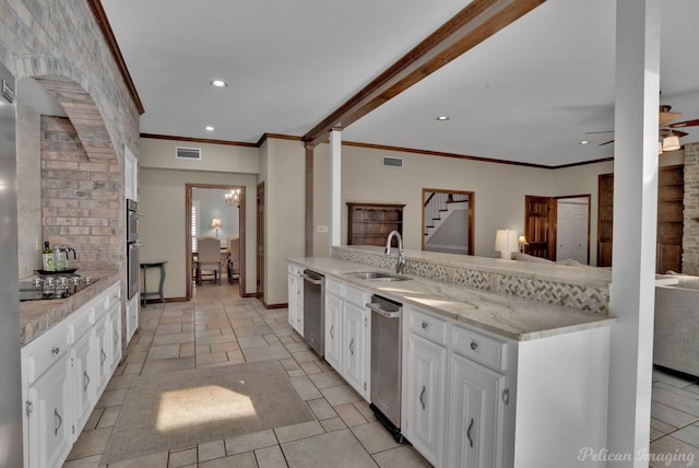 9808 Neesonwood Dr, Shreveport, LA 71106 - kitchen featuring a sink, black cooktop, ornamental molding, white cabinetry, and recessed lighting