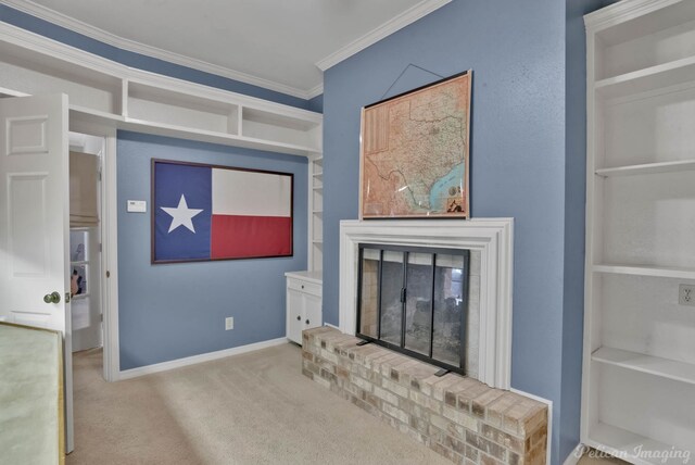 carpeted living room with crown molding, a fireplace, and built in shelves