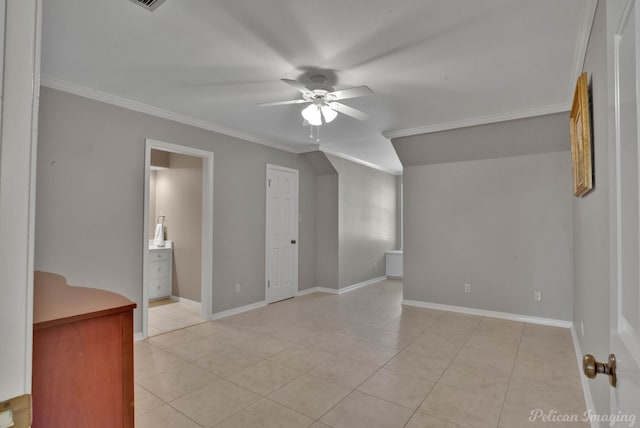 tiled spare room with crown molding and ceiling fan