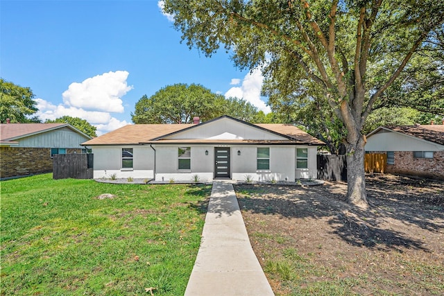 view of front of property with a front lawn