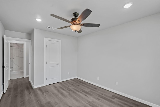 unfurnished bedroom featuring ceiling fan and wood-type flooring