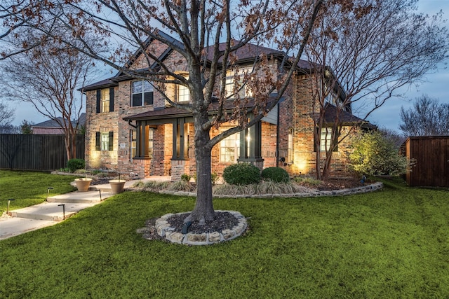 view of front of home featuring a front yard