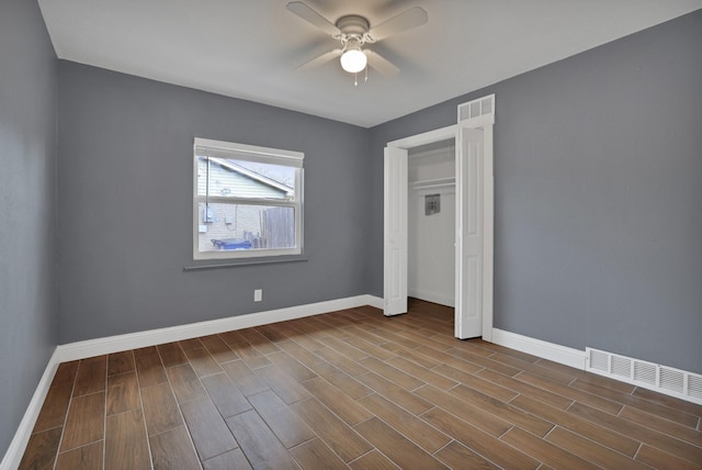 unfurnished bedroom featuring ceiling fan