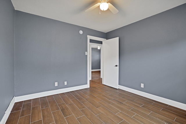 unfurnished room with ceiling fan