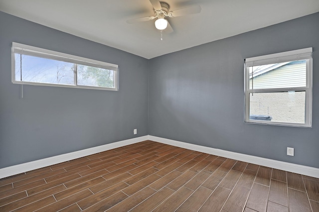 unfurnished room with ceiling fan