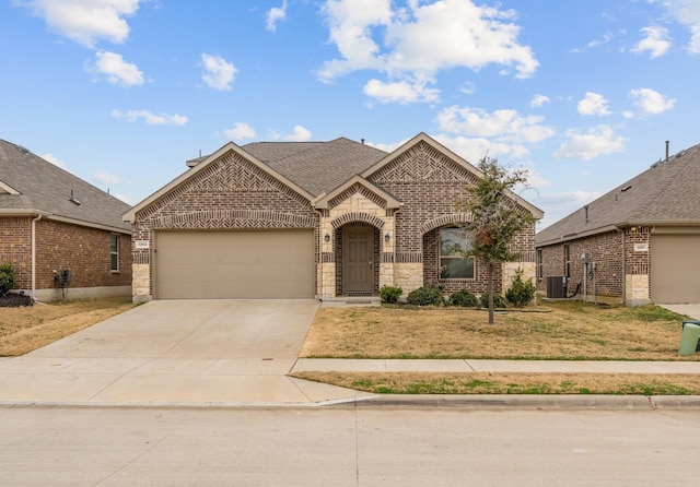 french provincial home featuring cooling unit, a garage, and a front yard