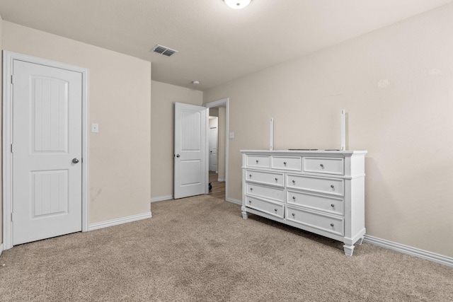 unfurnished bedroom with carpet floors