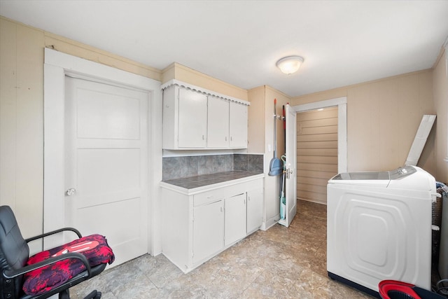 laundry room with cabinets and washing machine and dryer