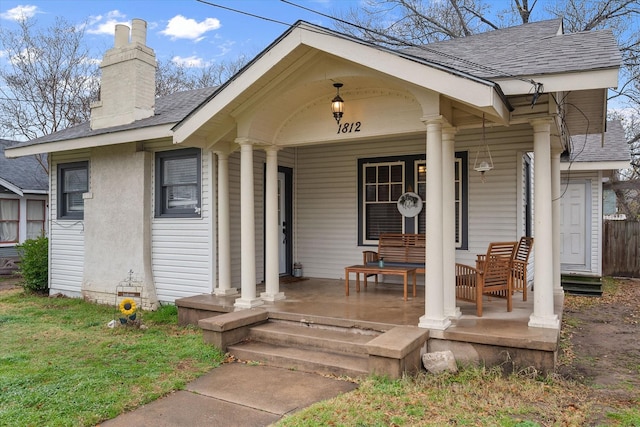 entrance to property with covered porch