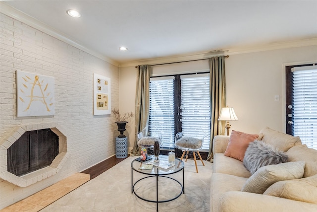 living room featuring crown molding and a fireplace