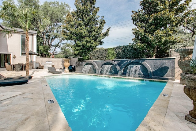 view of pool with a patio area