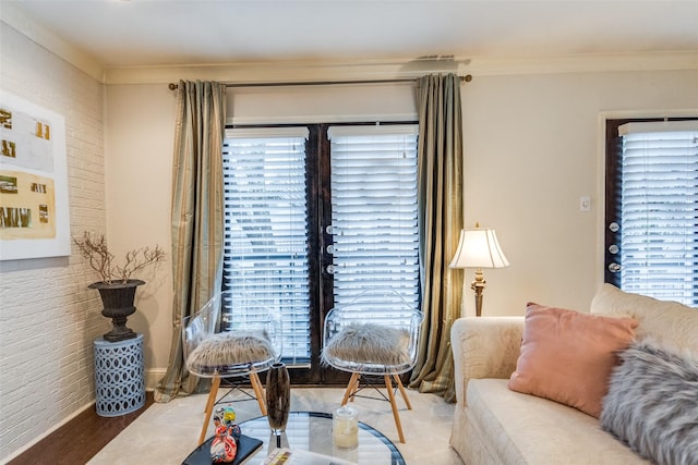 living room featuring crown molding