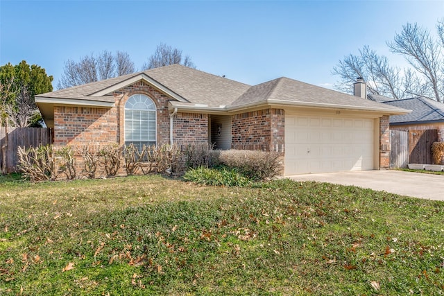 ranch-style house featuring a garage and a front yard