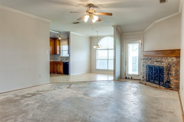 unfurnished living room featuring ornamental molding, ceiling fan with notable chandelier, and a fireplace