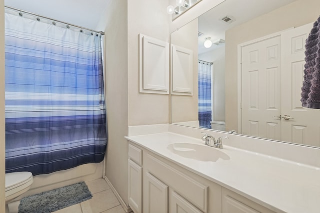 bathroom with a shower with shower curtain, vanity, toilet, and tile patterned flooring