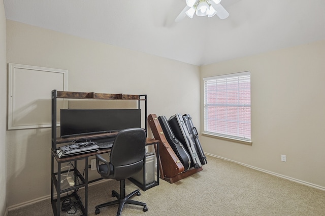 home office with lofted ceiling, carpet floors, and ceiling fan