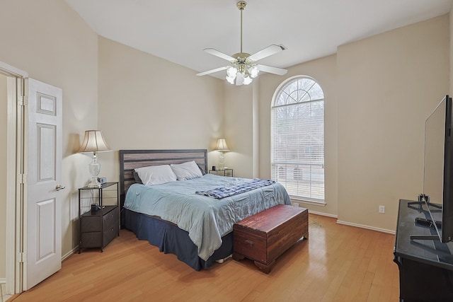 bedroom featuring ceiling fan and light wood-type flooring