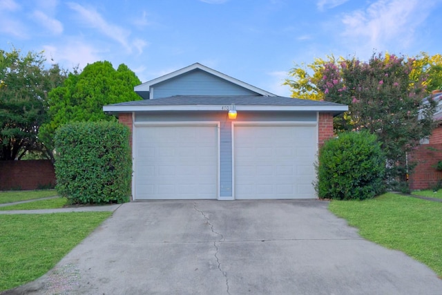 garage with a lawn