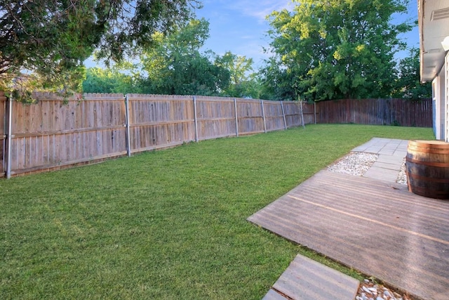 view of yard with a wooden deck