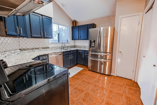 kitchen with blue cabinetry, lofted ceiling, appliances with stainless steel finishes, and sink