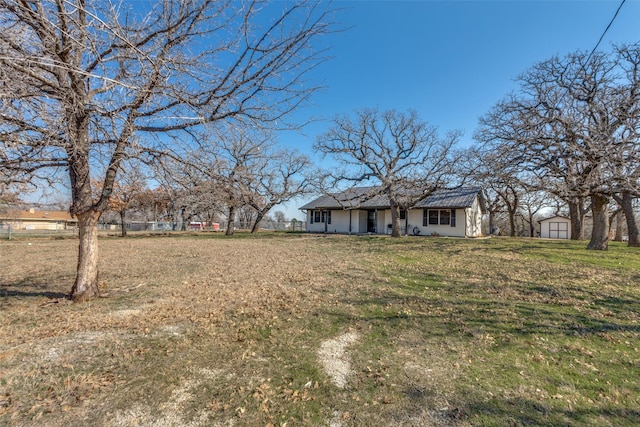 view of yard with a shed