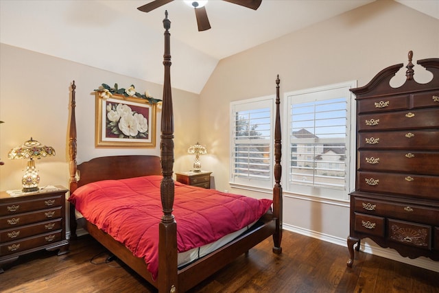 bedroom with dark hardwood / wood-style flooring, vaulted ceiling, and ceiling fan