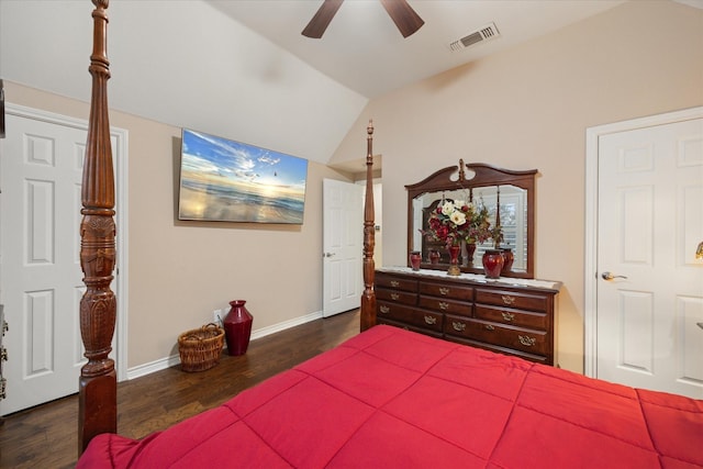 bedroom with vaulted ceiling, dark hardwood / wood-style floors, and ceiling fan