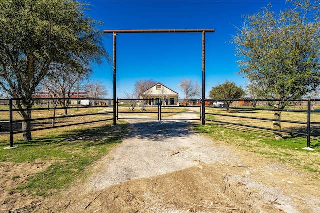 exterior space with a rural view