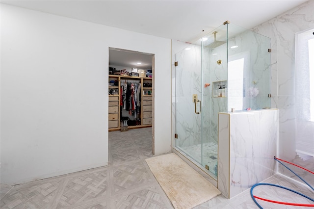 bathroom featuring an enclosed shower