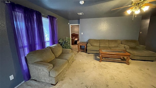 living room with ceiling fan