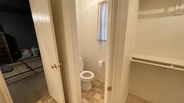 bathroom featuring toilet