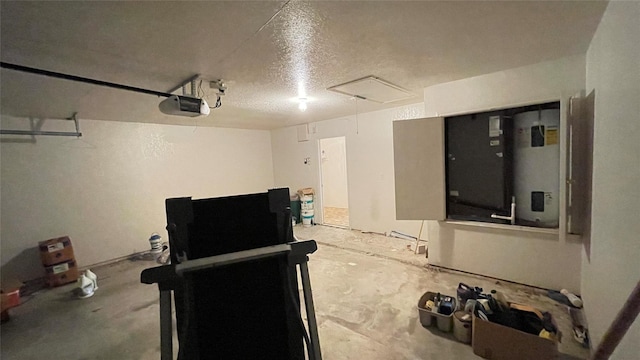 exercise area featuring a textured ceiling