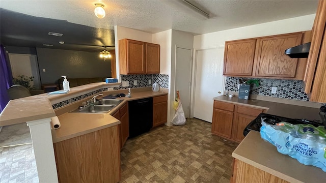 kitchen with sink, dishwasher, decorative backsplash, exhaust hood, and kitchen peninsula