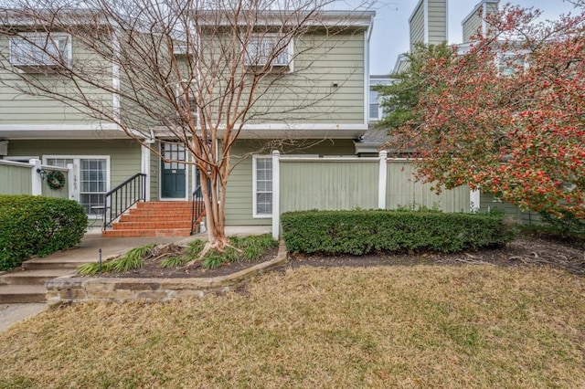 exterior space with a front lawn