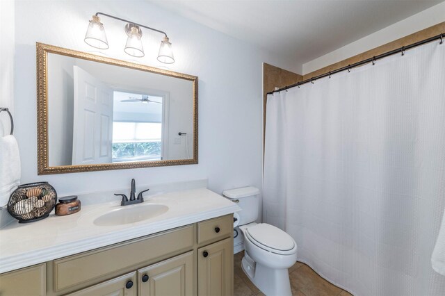 720 Amistad Dr, Prosper, TX 75078 - bathroom with toilet, vanity, tile patterned floors, and curtained shower
