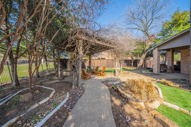 720 Amistad Dr, Prosper, TX 75078 - fenced backyard featuring a patio area