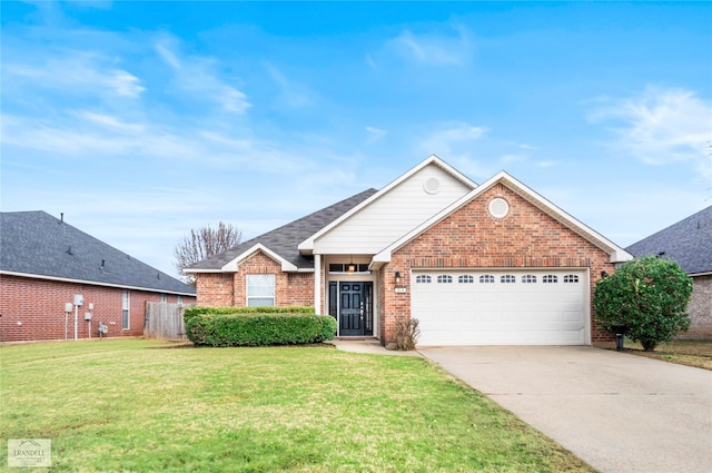 view of front facade featuring a garage and a front yard