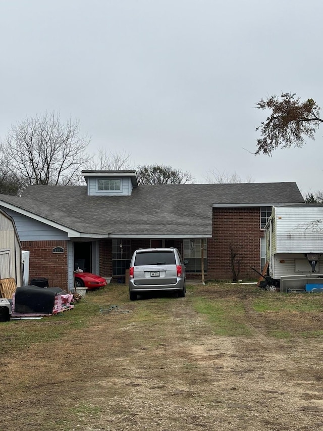 exterior space with a front yard