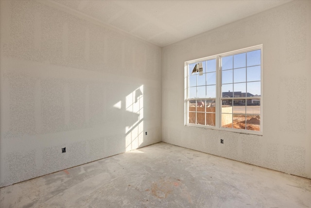 spare room featuring concrete floors